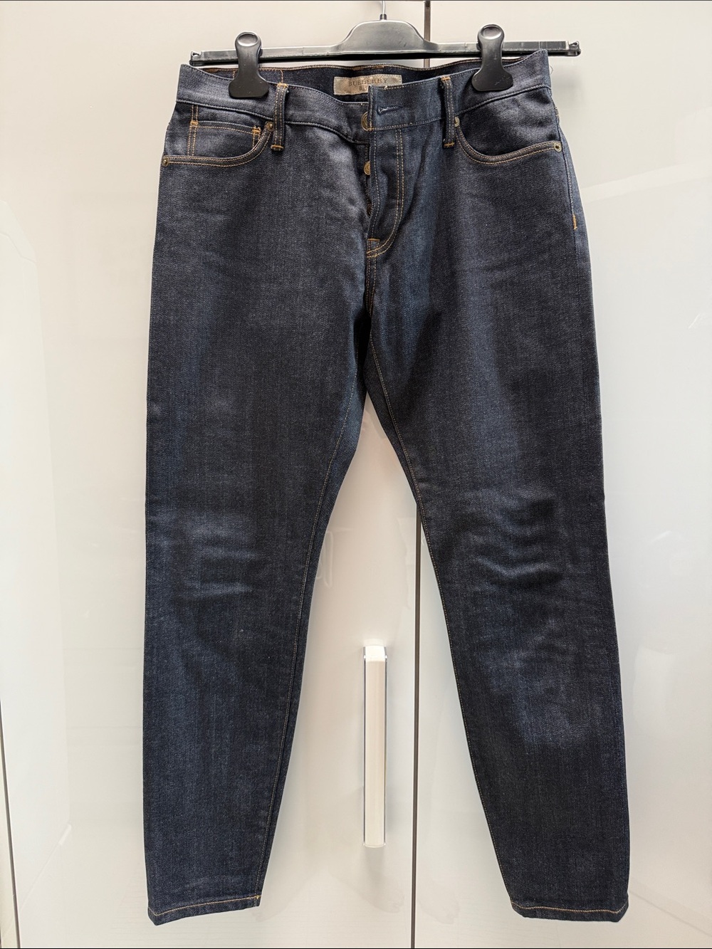 Burberry Woman Relaxed Skinny Jeans in Dark Indigo with Contrast Stitching.